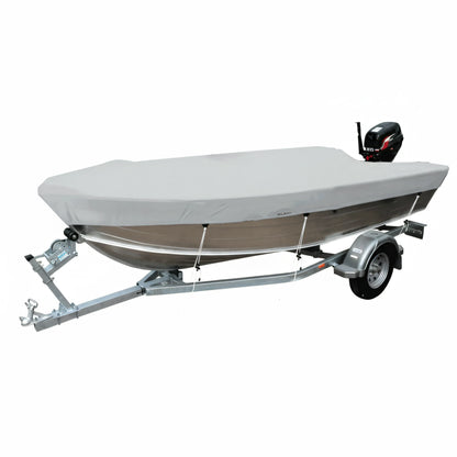 Telo copribarca Oceansouth grigio montato su lancia in alluminio con fuoribordo, ferma sul carrello