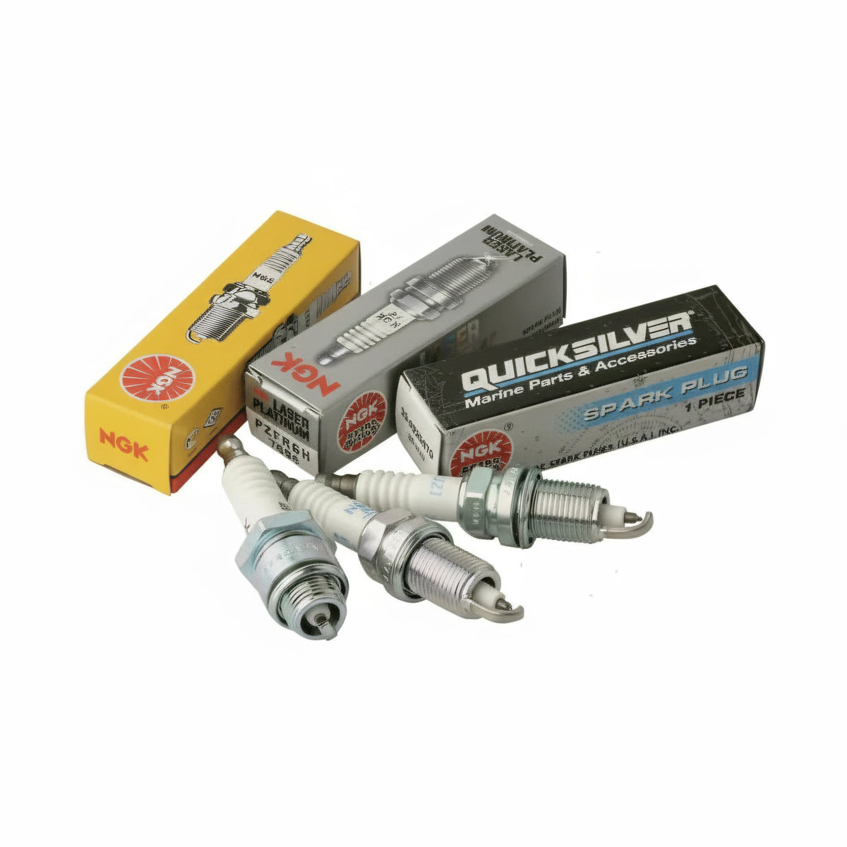Candele NGK in confezione gialla, grigia e Quicksilver nera con 3 candele metalliche bianche