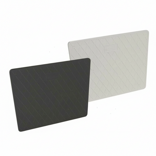 Piastre salvapoppa 320x220 mm in gomma nera e bianca, superficie rigata con sagoma