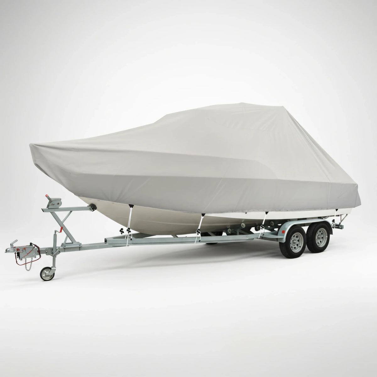 Telo copribarca Jumbo Oceansouth grigio montato su barca con T-Top ferma sul carrello